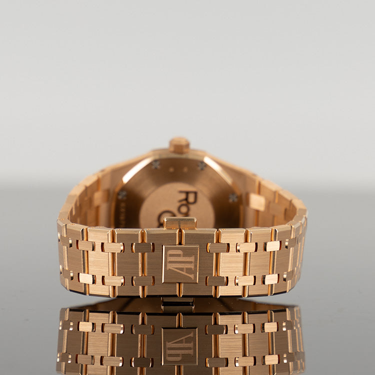 Audemars Piguet Royal Oak 67651OR — Rose Gold Blue Dial Rose Gold Diamond 33mm