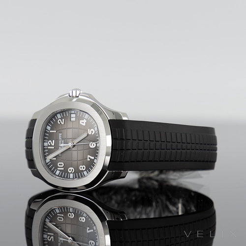 Patek Philippe Aquanaut — Black Dial Steel 40.8mm